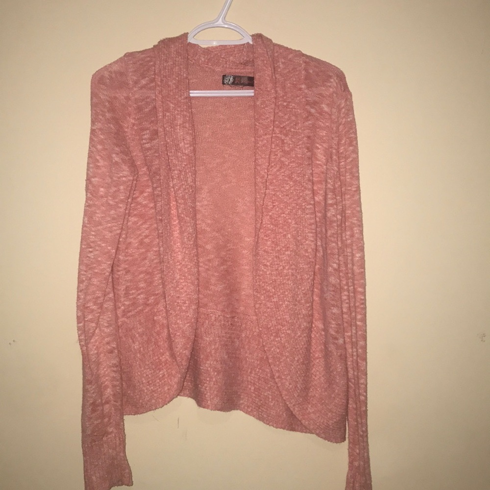 A pink sweater